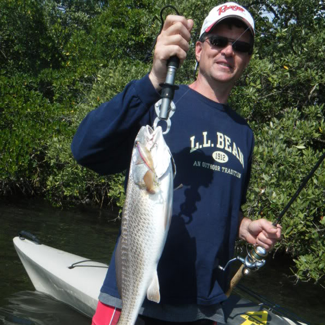 Despite the tough bite, Jeff had a fun time bringing up this Redfish from the kayak. 