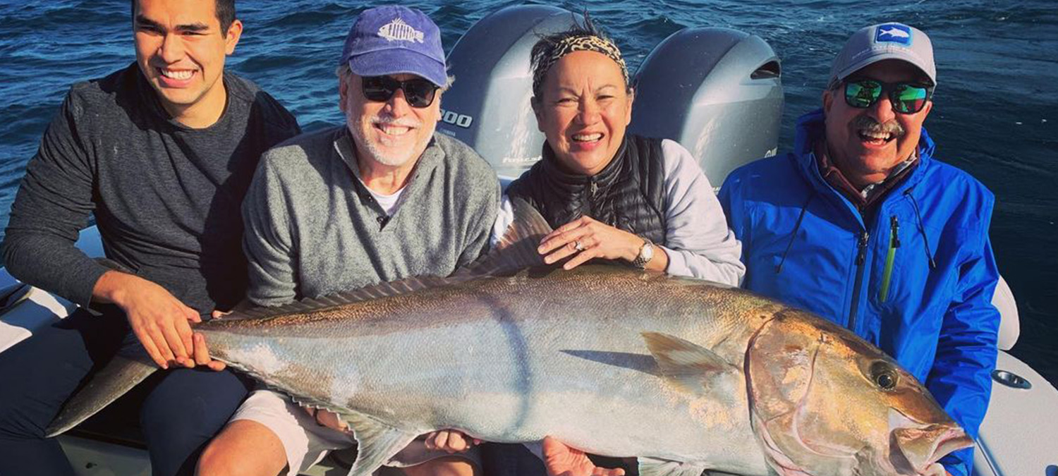 Some clients representing on the water during an offshore fishing charter.